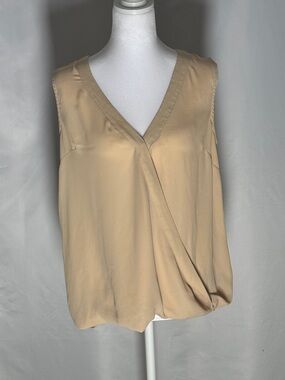 Ark & Co Boutique draped sleeveless blouse in a soft neutral tone